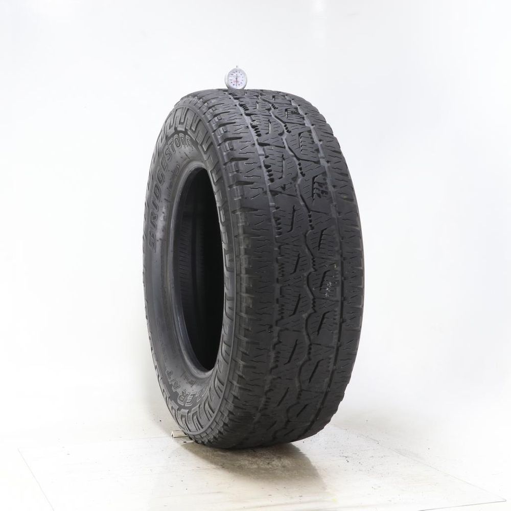 Used LT 285/65R18 Bridgestone Dueler A/T REVO 3 125/122S E - 7/32 - Image 1